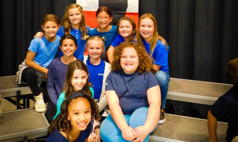Students sing in Veterans Day performance